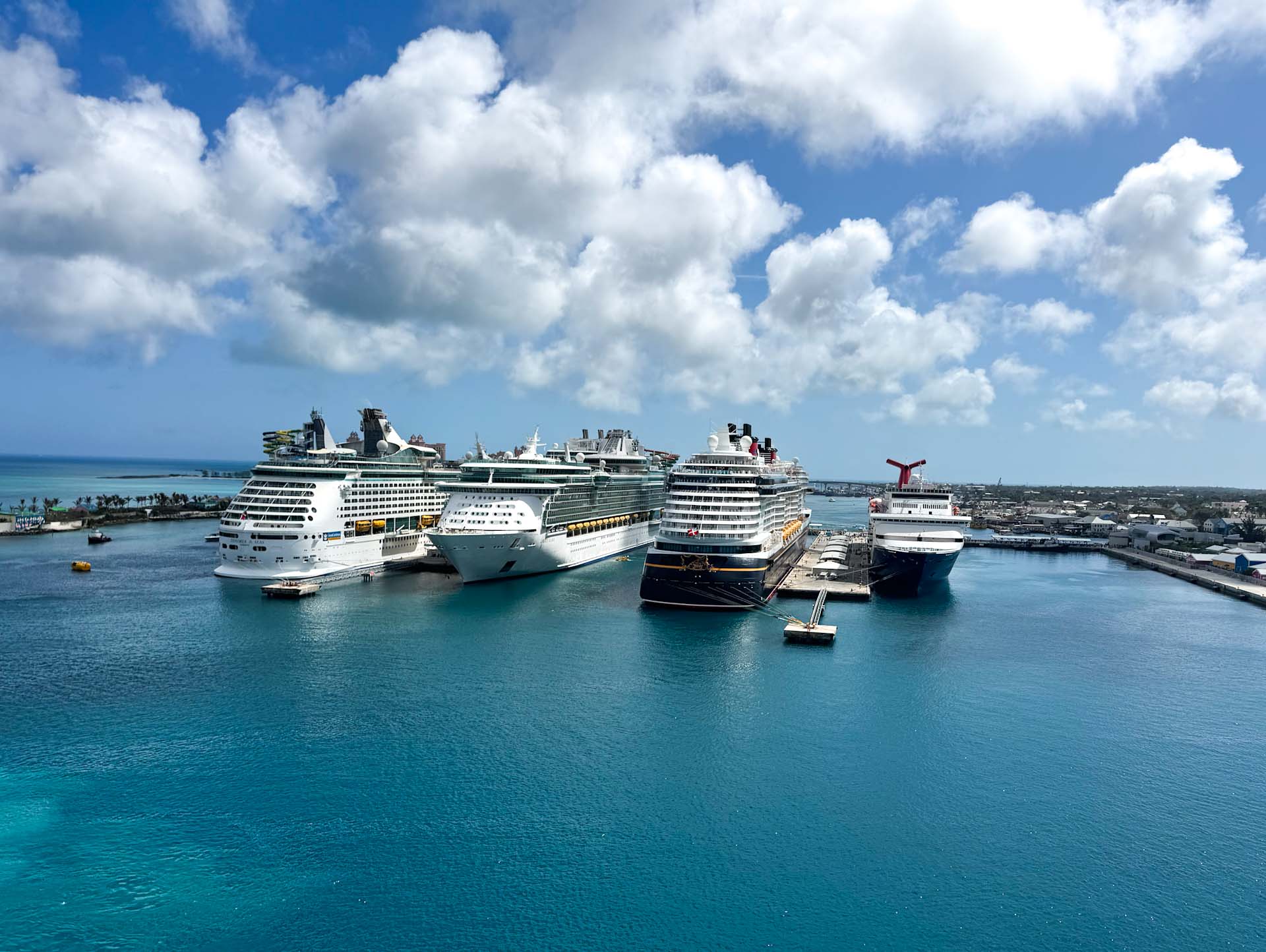 4 cruise ships lined up at a port in Nassau Bahamas