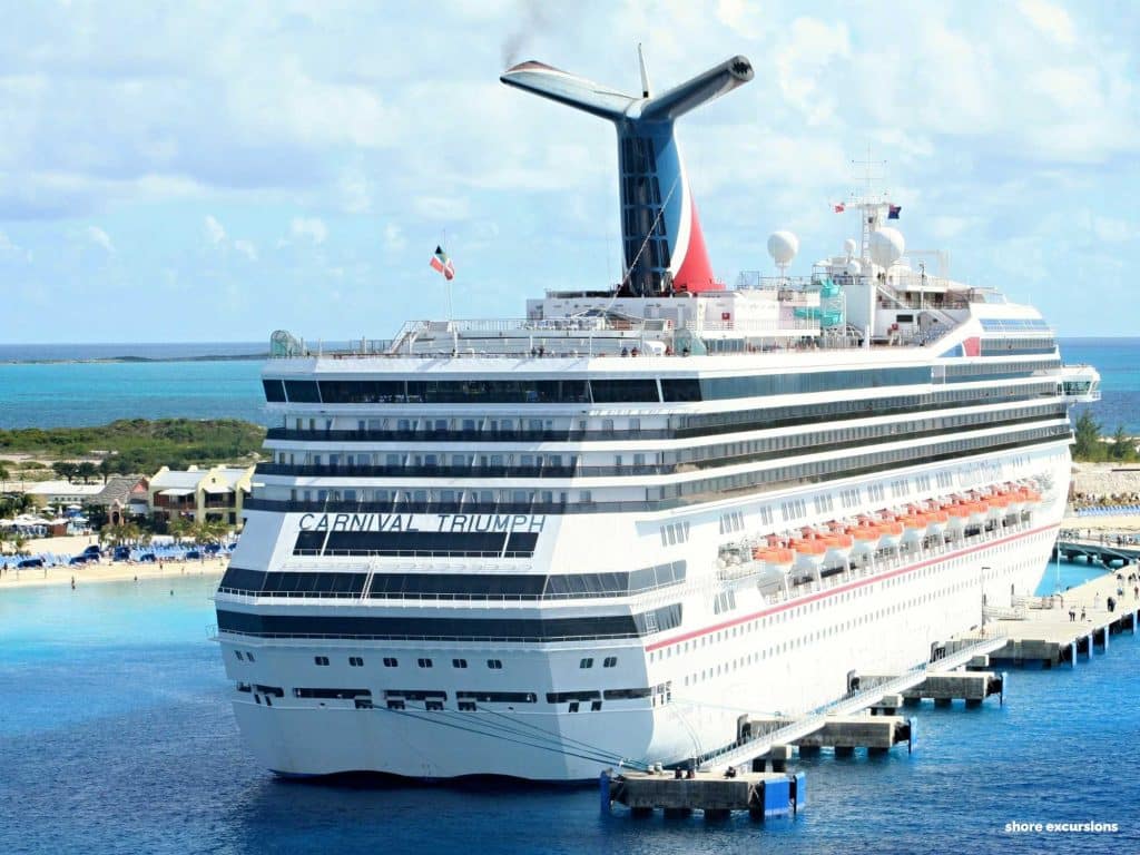 Carnival cruise ship sits at dock, awaiting the start of another family friendly cruise